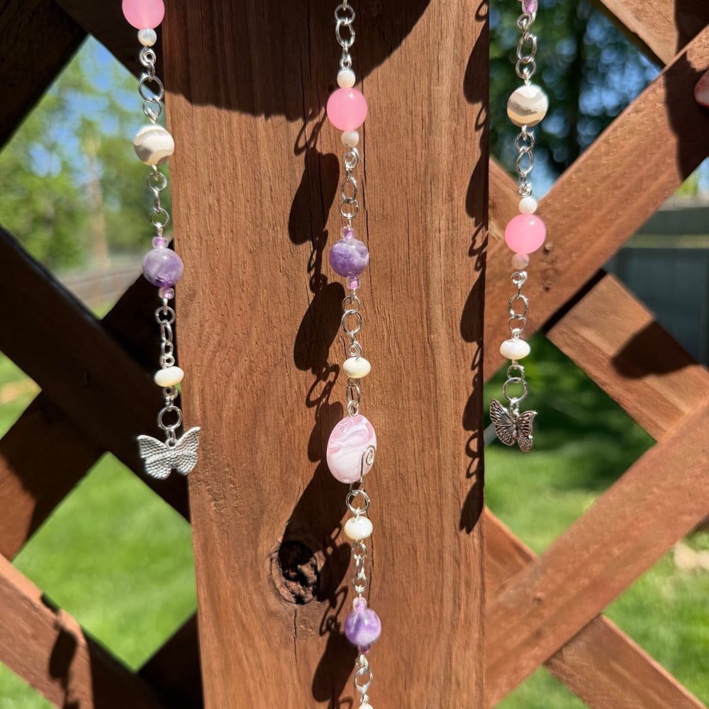 Image of divine butterfly hanging beaded wood art