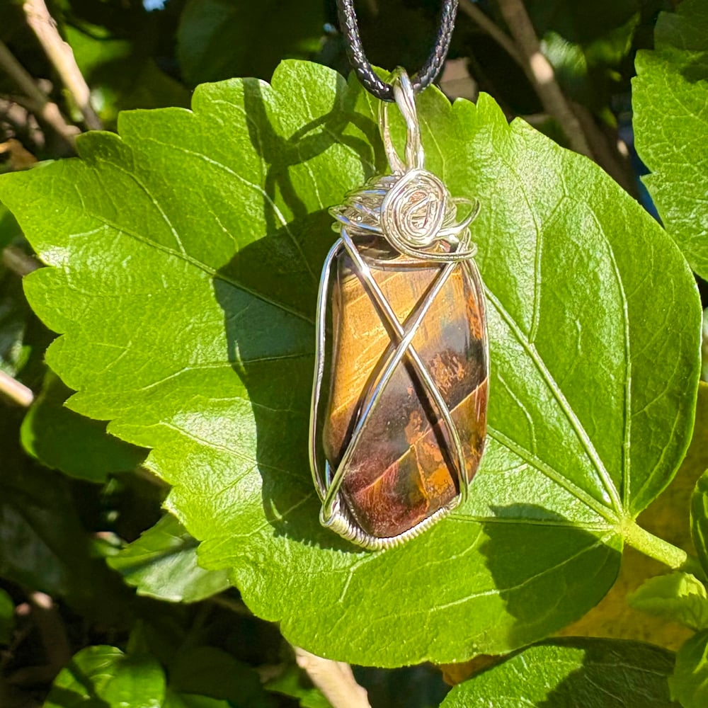Image of tiger’s eye pendant a