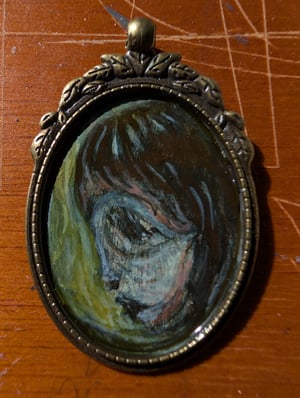 Image of Girl with a skull mask