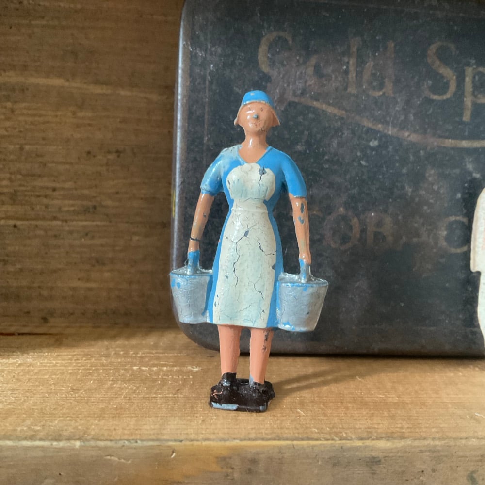 Image of Milkmaid,Cow,Fence & Tin