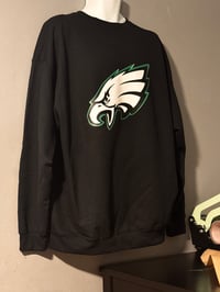 Black sweatshirt with Eagles logo