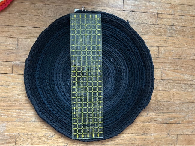 black t-shirt yarn crochet round rug, 2’ diameter