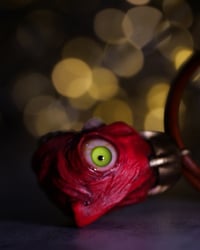 Image 15 of Egg of the King big eyes pendant, leather cord, brass hardware, OOAK,