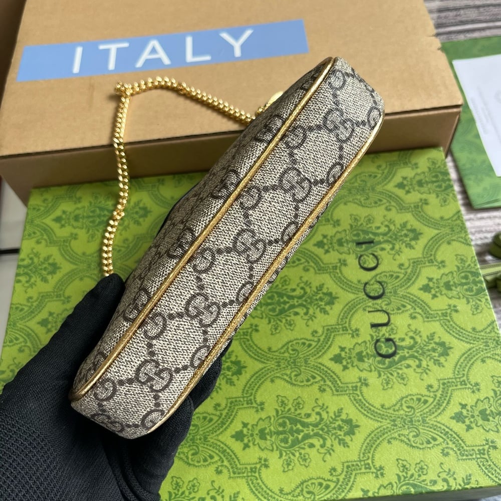 GG Canvas Mini Pochette 