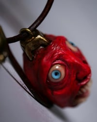 Image 12 of Berserk Egg of the King bleeding eyes pendant, leather cord, brass hardware, OOAK,