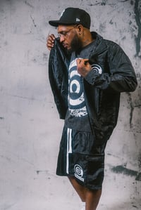 Image 3 of Acid Wash Cream Flagship Tee