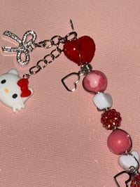 Image 4 of ✨❤️‍🔥red hello kitty clip❤️‍🔥✨