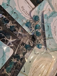 Image 3 of lagoon teal seaglass wine charms