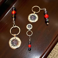 Supernatural glass bead charm keychain