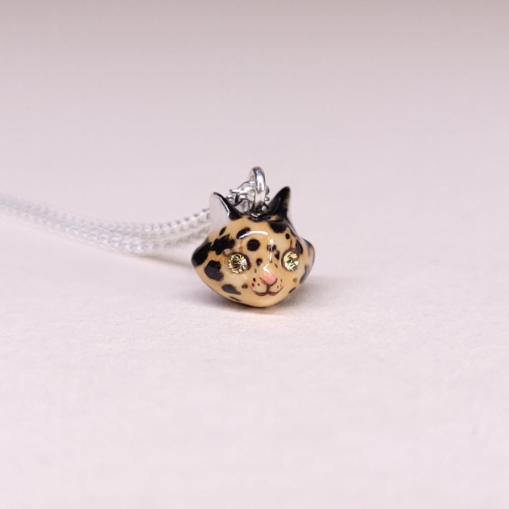 Image of Tortoiseshell  Porcelain & Gold Vermeil Teeny Tiny Cat Pendant