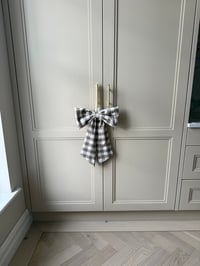 Image 2 of The Oat Check Story Bow