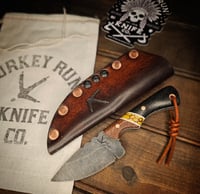 Image 1 of JAKE • micarta & yellow dino bone trustone