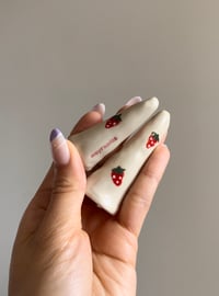 Image of Strawberry ring holders
