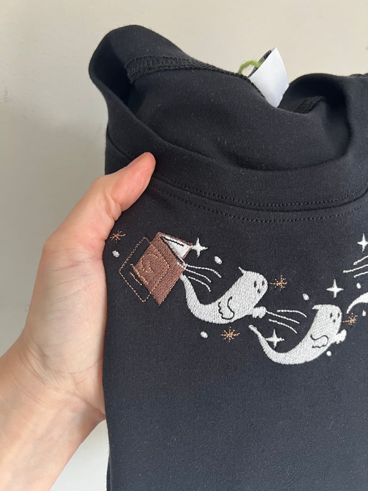 Image of age 7-8 long sleeve tee FAULTY STITCHING black
