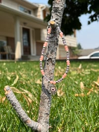 Coral & Clear Seed Evil Eye 