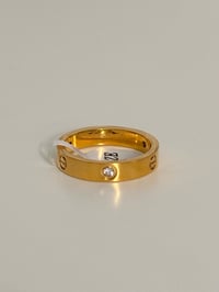 Image 1 of GOLD LOVE RING WITH 3 STONES 4MM