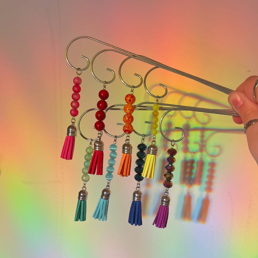 Image of rainbow planter stakes