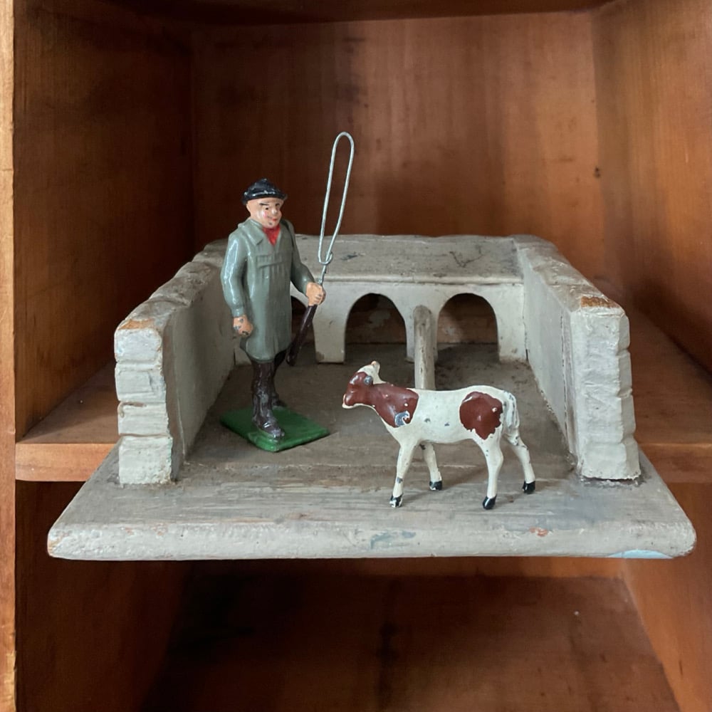Image of Farmer,Calf & Shelter