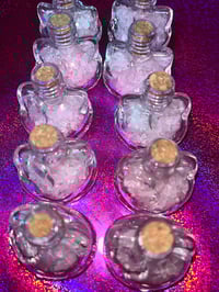 Image 1 of hello kitty glassed filled jars