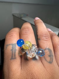 Image 4 of blue alien ring