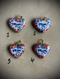 Image 1 of motherly love charm