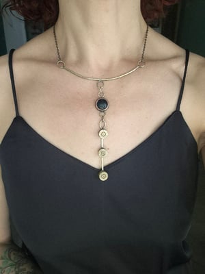 3 bullet casings and black stone necklace  copy