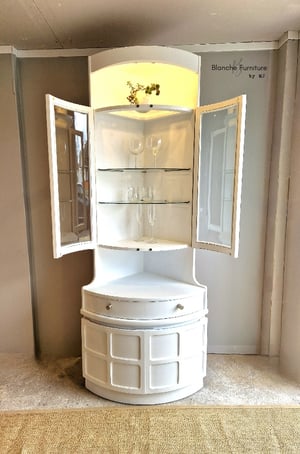 Image of Nathan Corner Drinks Cabinet unit in White with light.