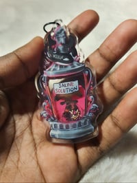 Image 2 of  Saline Solution shaker keychain