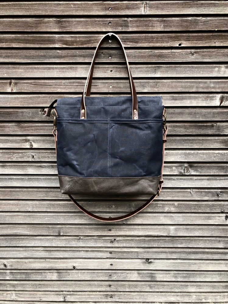 Image of Black Waxed canvas carryall with handwoven exterior pocket 