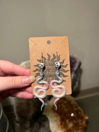 Image 1 of trans snakes