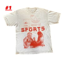 Image 1 of red ink SPORTS on worn in shirt. front and back.