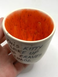 Image 3 of This kitty craves chaos in red