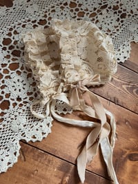 Image 6 of Antique Beige Lace Newborn Bonnet Silk Tie