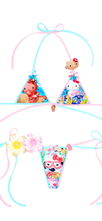 Image 5 of Diver swimming with tropical fish hellokitty