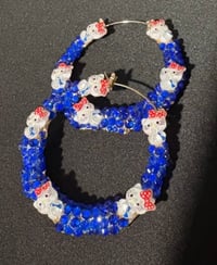 Blue hello kitty earrings