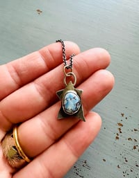 Image 1 of sterling silver star pendant with Golden Hills turquoise