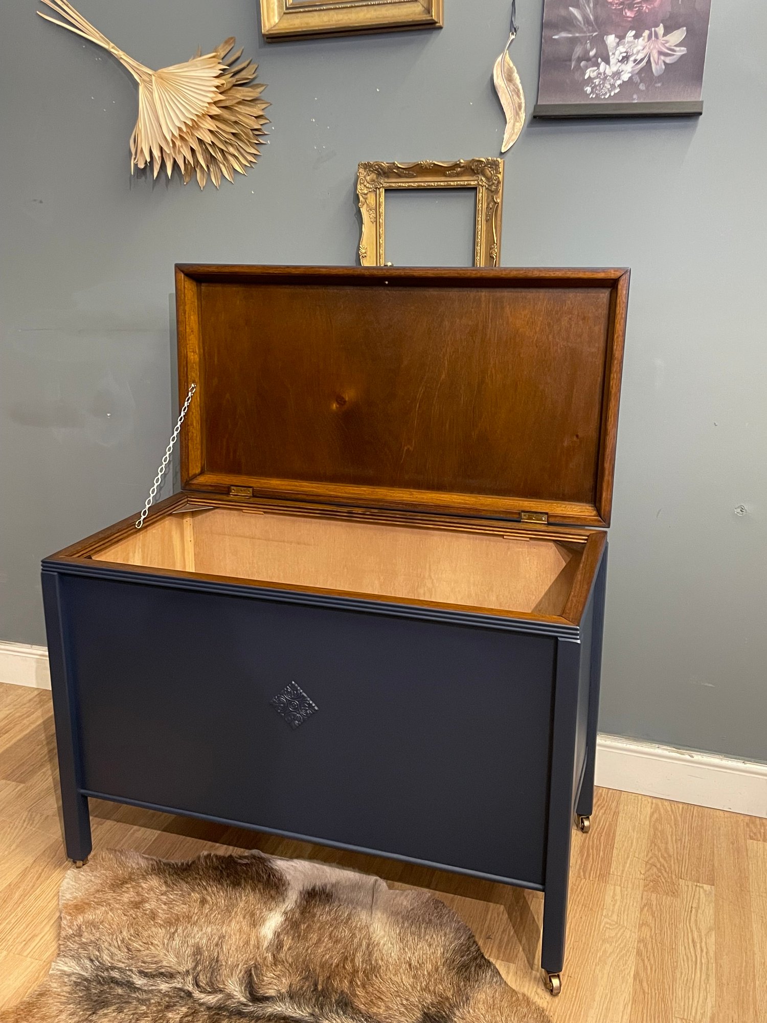 Image of Dark blue blanket storage box