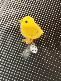 Image 2 of chick badge reel 