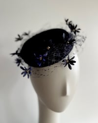 Image 1 of Navy felt button. SOLD