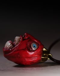 Image 4 of Berserk Egg of the King bleeding eyes pendant, leather cord, brass hardware, OOAK,