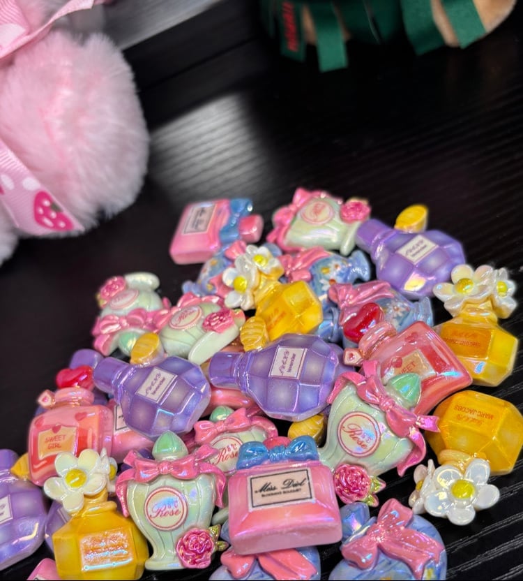 Image of glossy perfumes mix