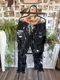 Image 1 of Bleached distressed black jeans 