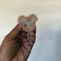 Puakenikeni Magical Lei Shaker Badge Reel