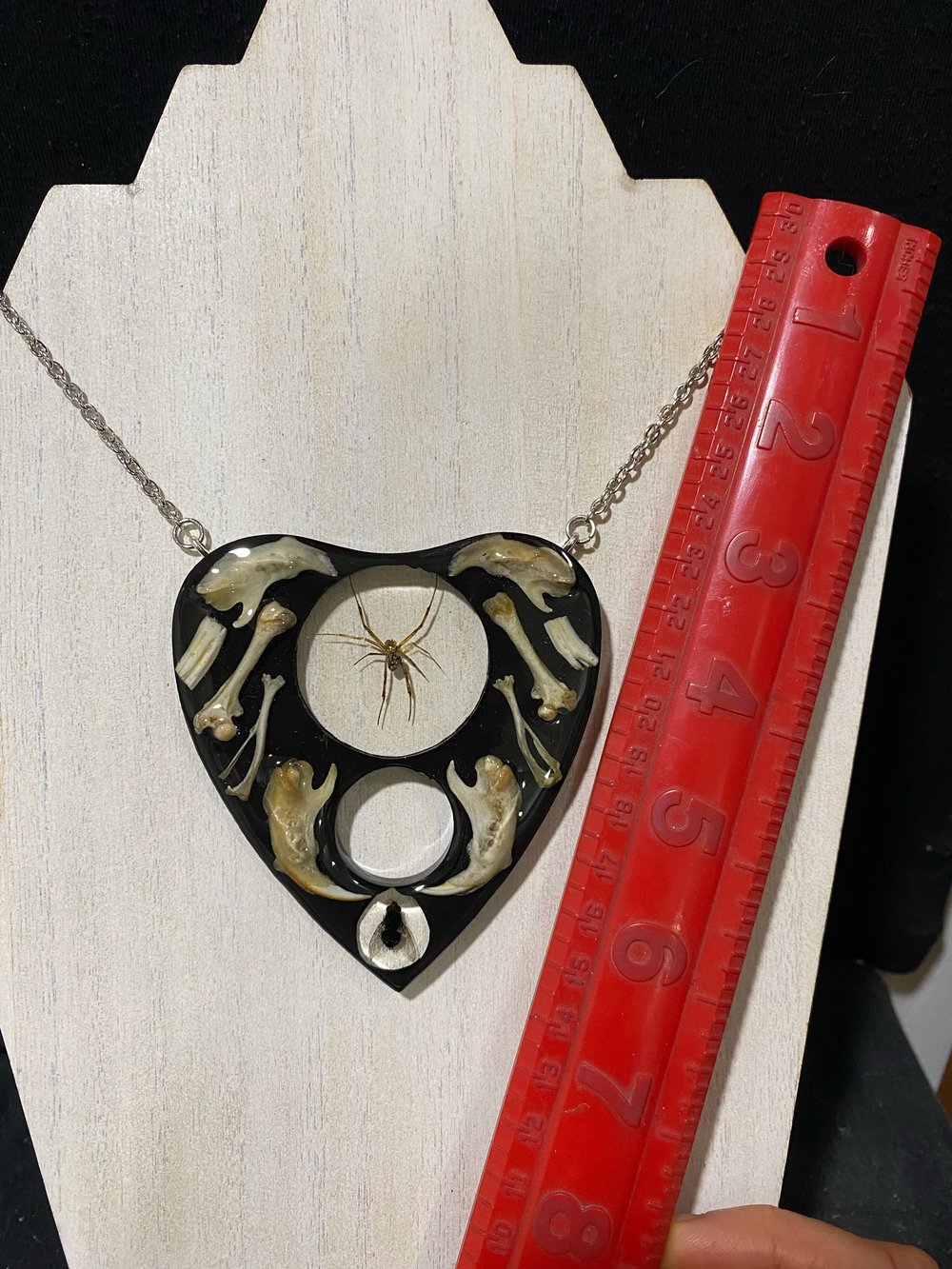 Juvenile black widow and bone oujia planchette pendant 