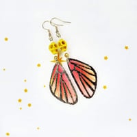 Image 2 of Skull + Wings Earrings