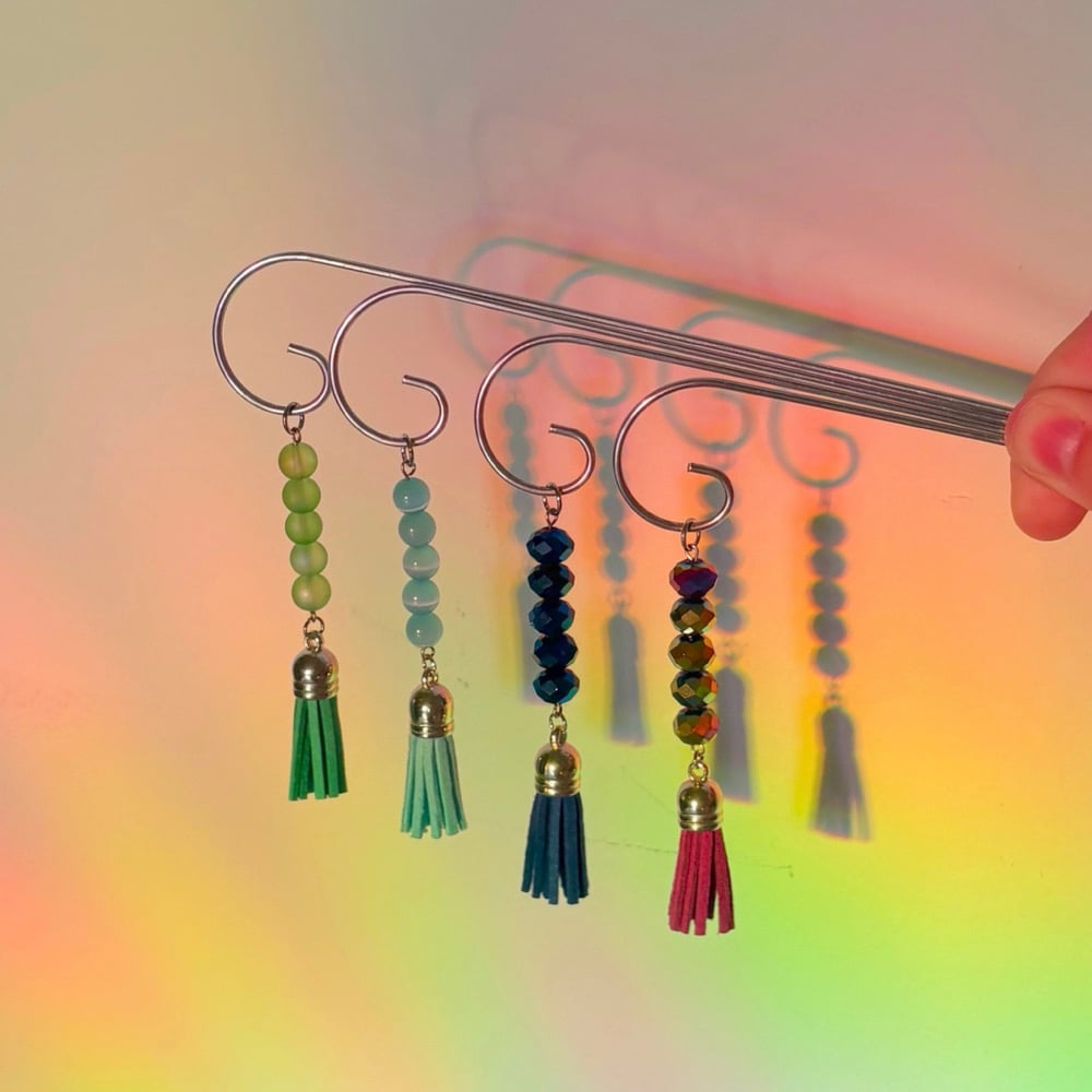 Image of rainbow planter stakes