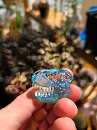 Image 4 of Mini Meta-Terrania T-Rex skull pendant. 🩵
