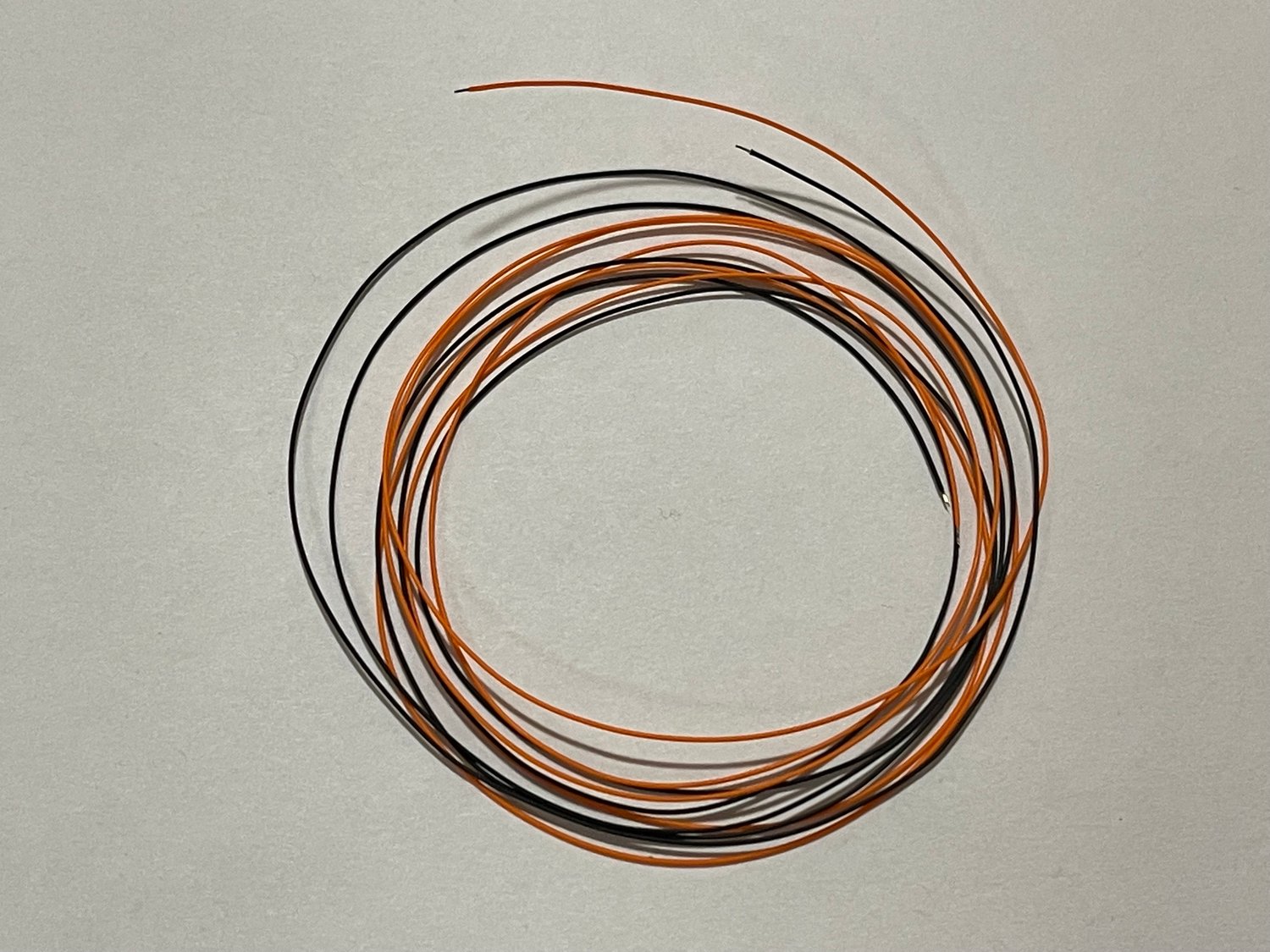 Spark plug wire material orange-black