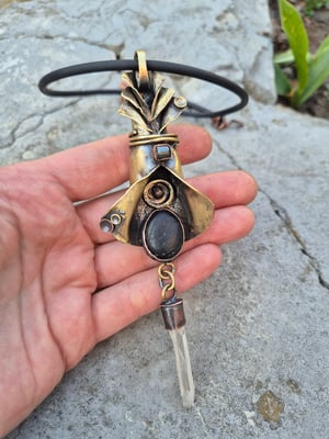Bullet casings, pebbles and crystal necklace 
