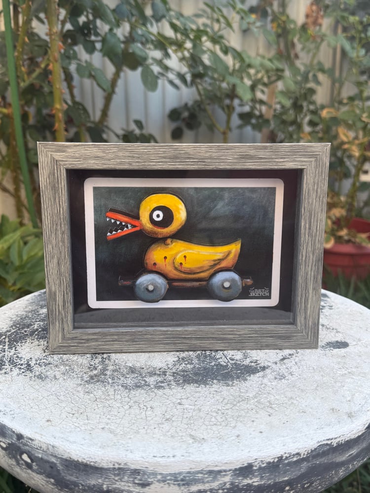 Image of “Evil Toy Duck” shadow box